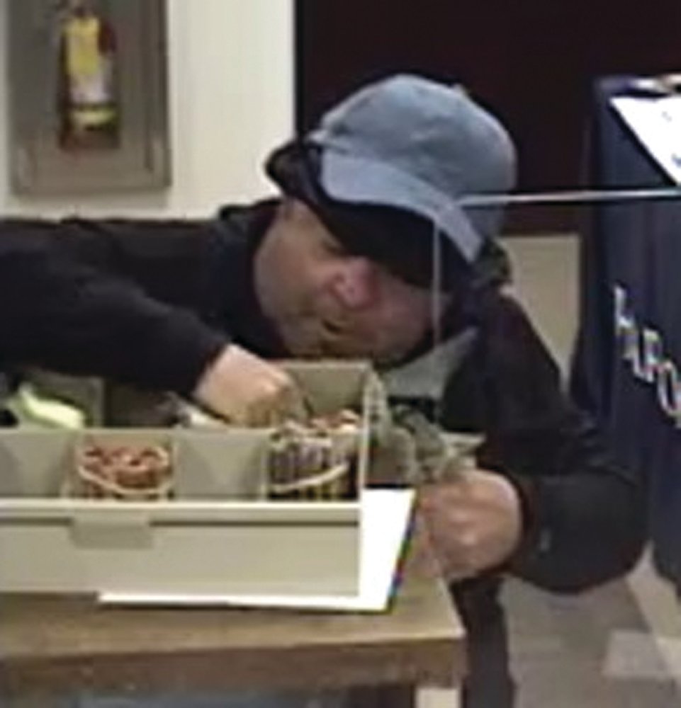 BANK ROBBERY: Warwick Police used surveillance images from the May 10 Harbor One Bank robbery to identify a suspect.